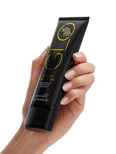 Load image into Gallery viewer, Bondi Sands GLO Shimmer One Day Tan 100ml tube held in hand, self tan